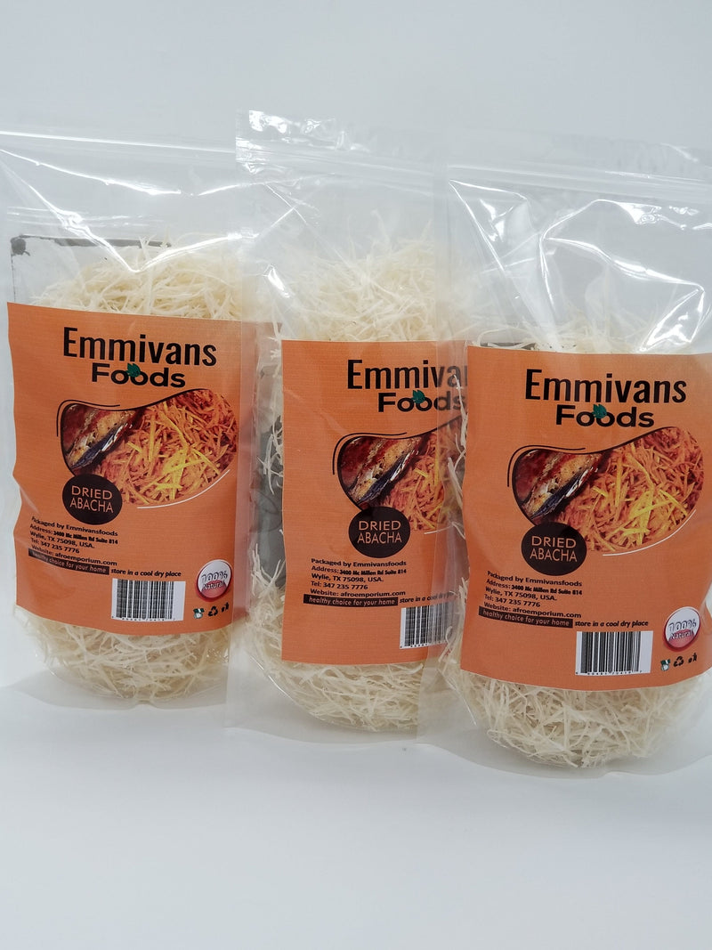 Three packs of sealed Abacha African Salad Dry Shredded Cassava with Emmivans Logo on it